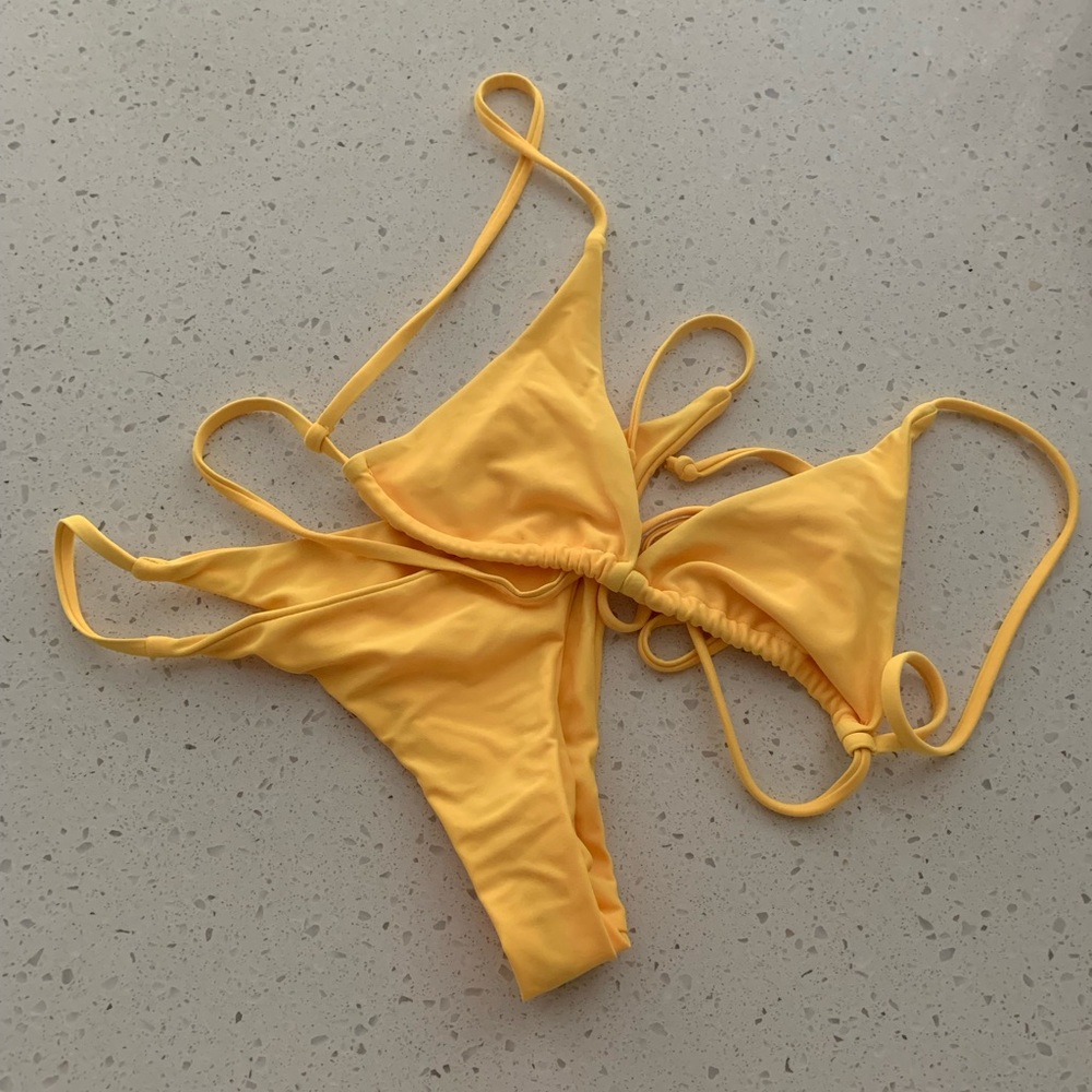 yellow bikini . size s . thong